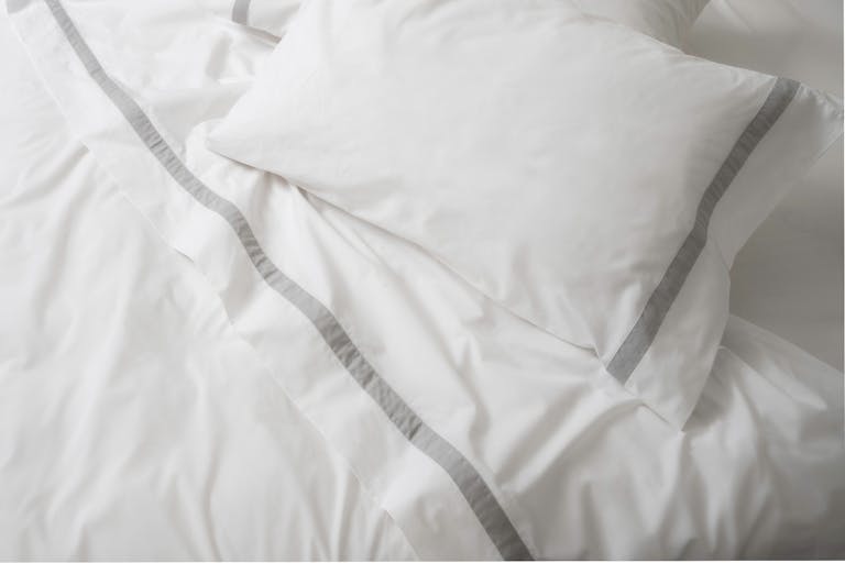 Banded Percale Pillowcase Pair lifestyle close up