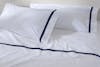 Banded Percale Pillowcase Pair lifestyle close up