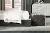 Constance Tufted Ottoman side